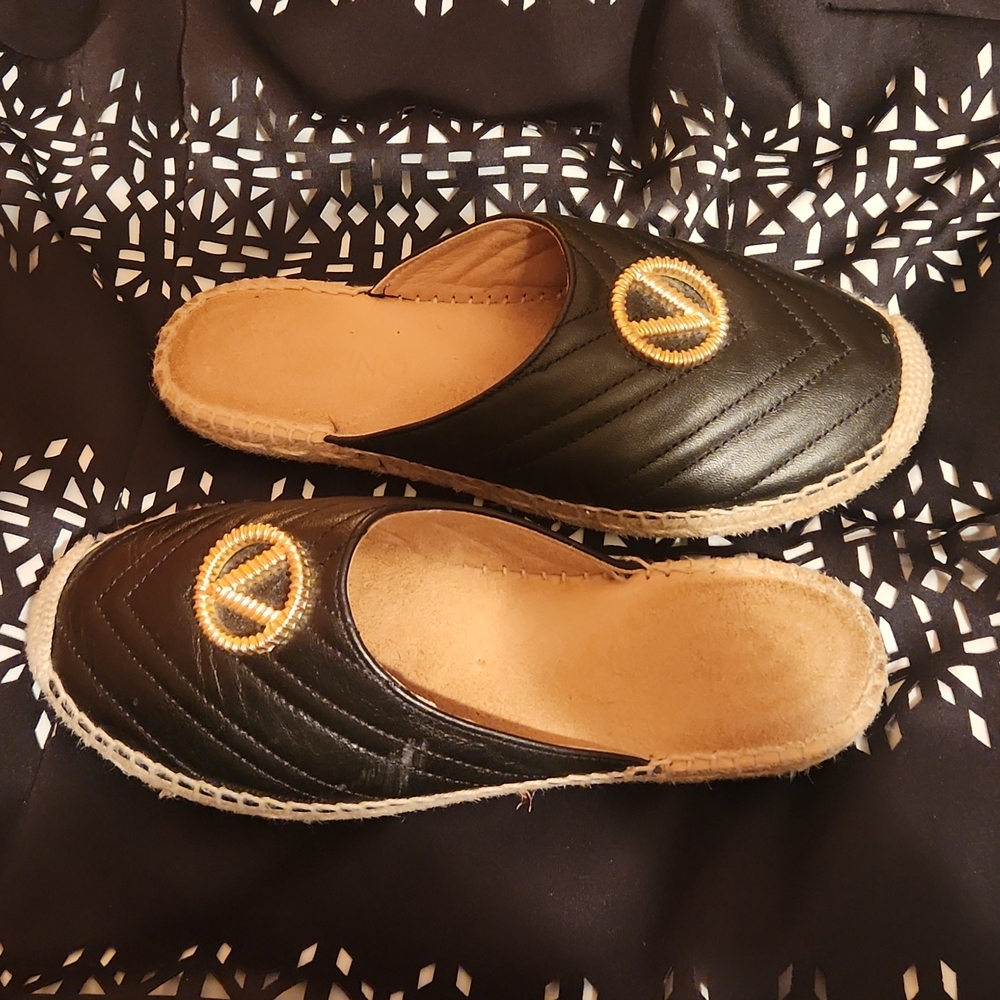 Valentino signature mule.
